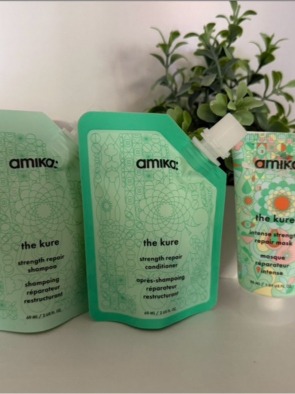 amika The Kure Strength Repair Conditioner - larger travel bundle